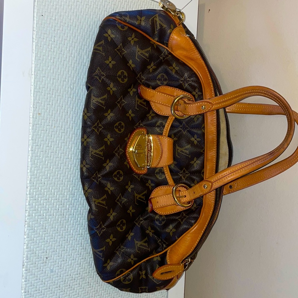 Authentic Louis Vuitton Bowling bag has been loved but in great condition